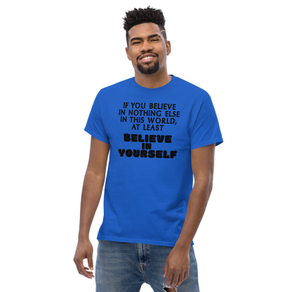 "If you believe in nothing else in this world, at least believe in yourself" printed on a royal unisex classic tee worn by a male