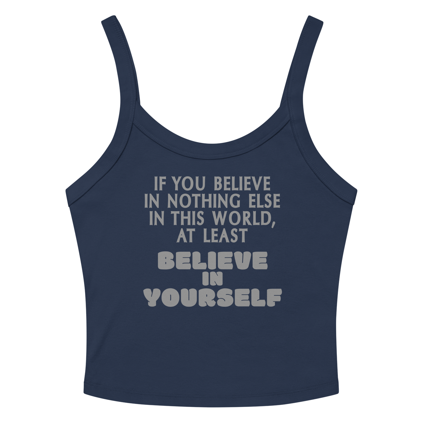 "If you believe in nothing else in this world, at least believe in yourself" printed on a solid navy blend women's micro-rib tanktop laying on a flat surface amongst sunglasses and shorts