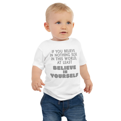 "If you believe in nothing else in this world, at least believe in yourself" printed on a white baby jersey short sleeve tee worn by a male