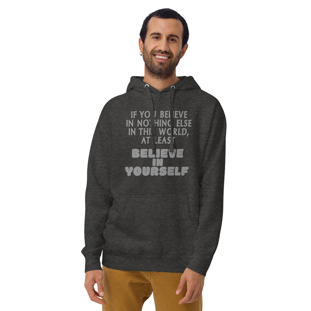 "If you believe in nothing else in this world, at least believe in yourself" printed on a charcoal heather warn by a male