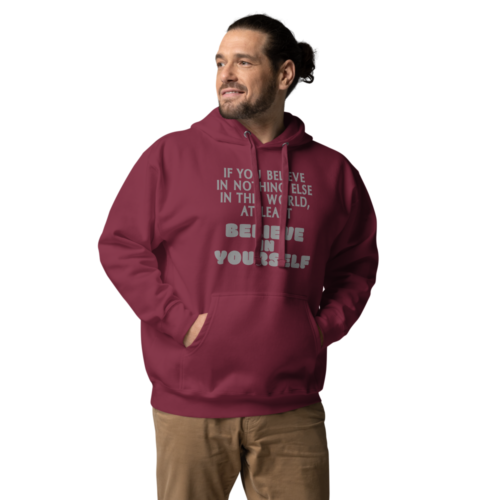 "If you believe in nothing else in this world, at least believe in yourself" printed on a maroon unisex hoodie worn by a male