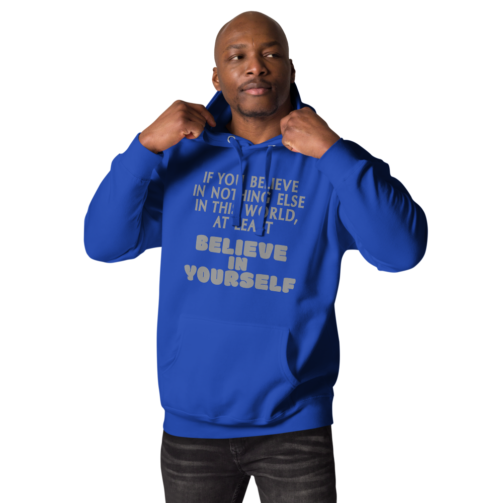 "If you believe in nothing else in this world, at least believe in yourself" printed on a team royal unisex hoodie worn by a male