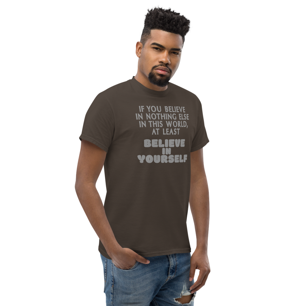 "If you believe in nothing else in this world, at least believe in yourself" printed on a dark chocolate unisex classic tee worn by a male