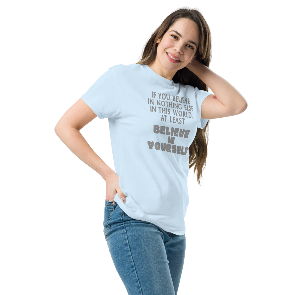 "If you believe in nothing else in this world, at least believe in yourself" printed on a light blue unisex classic tee worn by a female