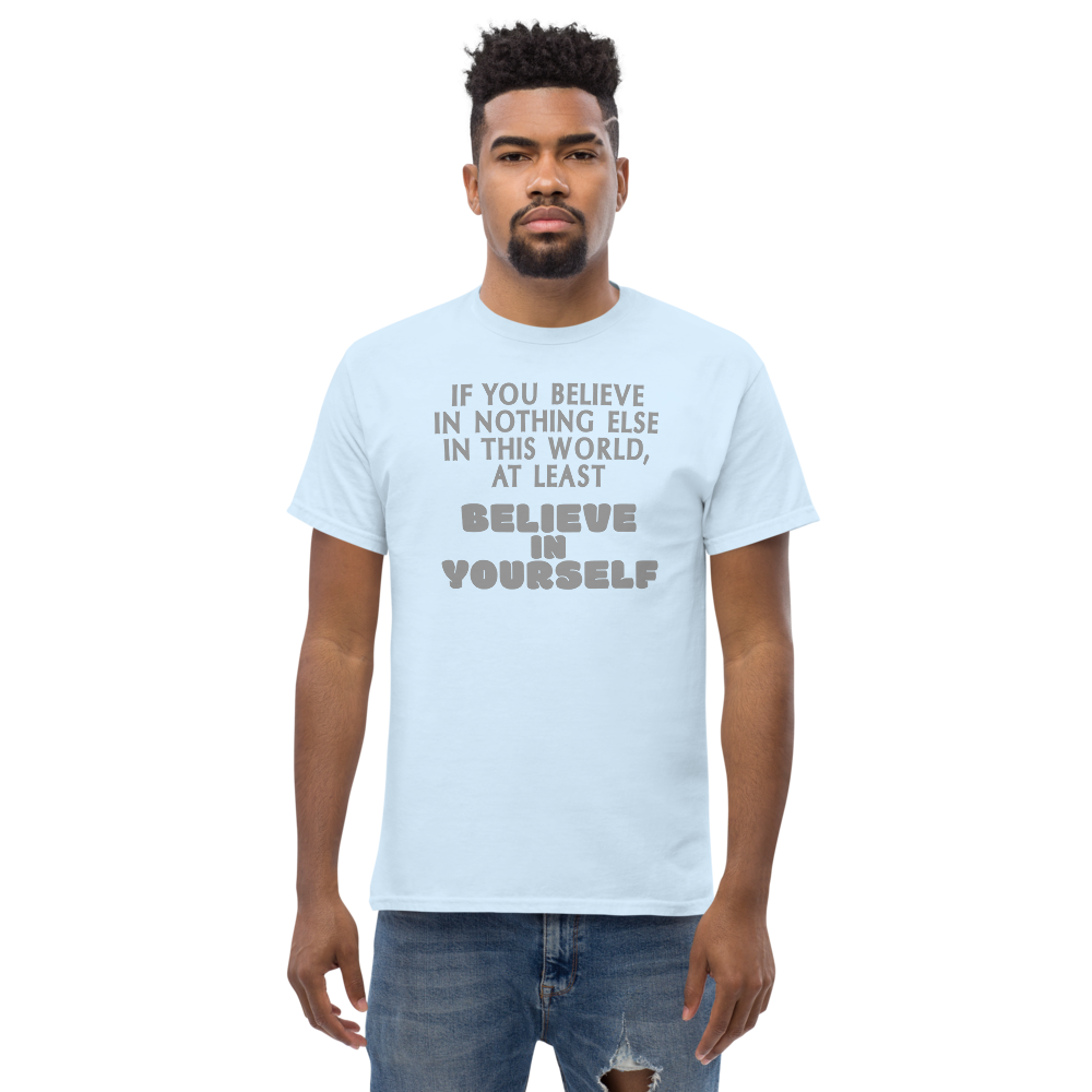 "If you believe in nothing else in this world, at least believe in yourself" printed on a light blue unisex classic tee worn by a male
