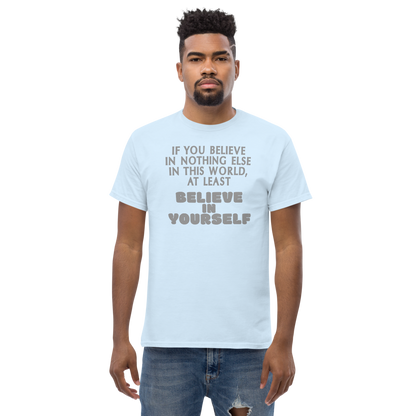 "If you believe in nothing else in this world, at least believe in yourself" printed on a light blue unisex classic tee worn by a male
