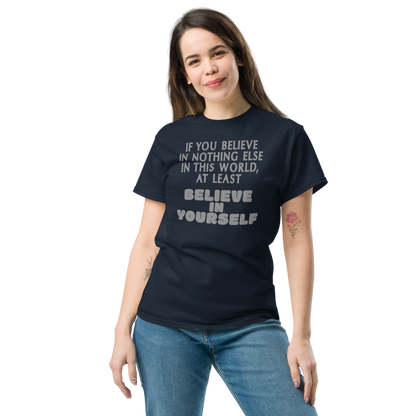 "If you believe in nothing else in this world, at least believe in yourself" printed on a navy unisex classic tee worn by a female