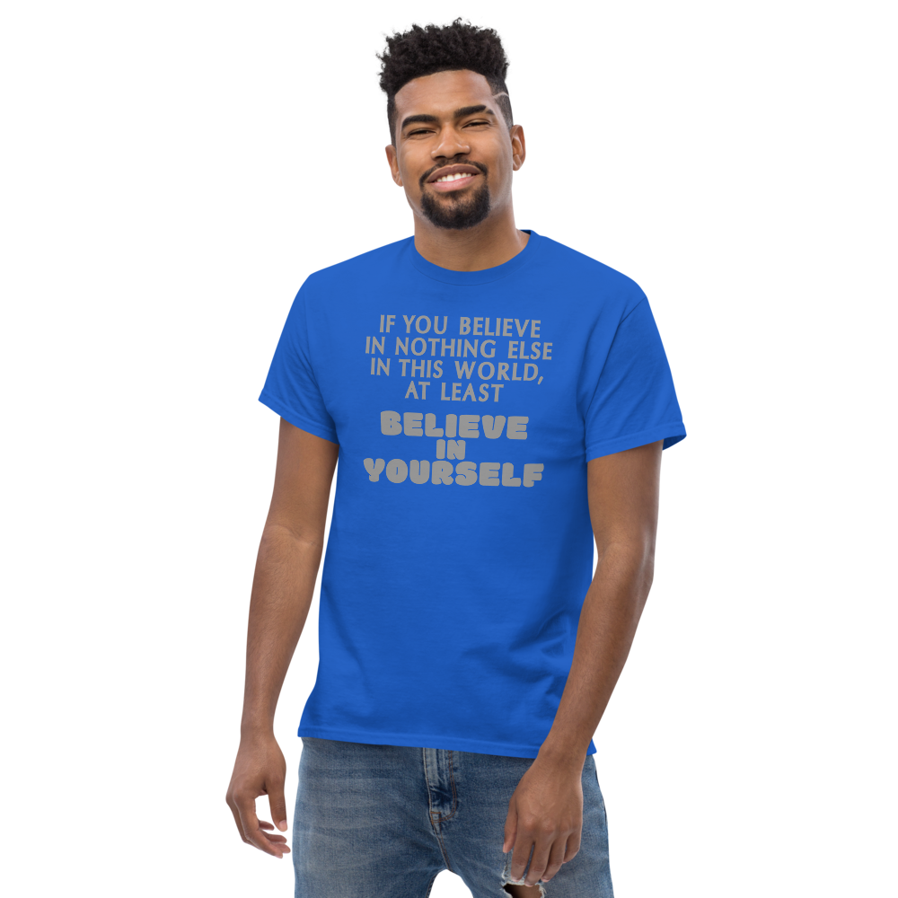 "If you believe in nothing else in this world, at least believe in yourself" printed on a royal unisex classic tee worn by a male