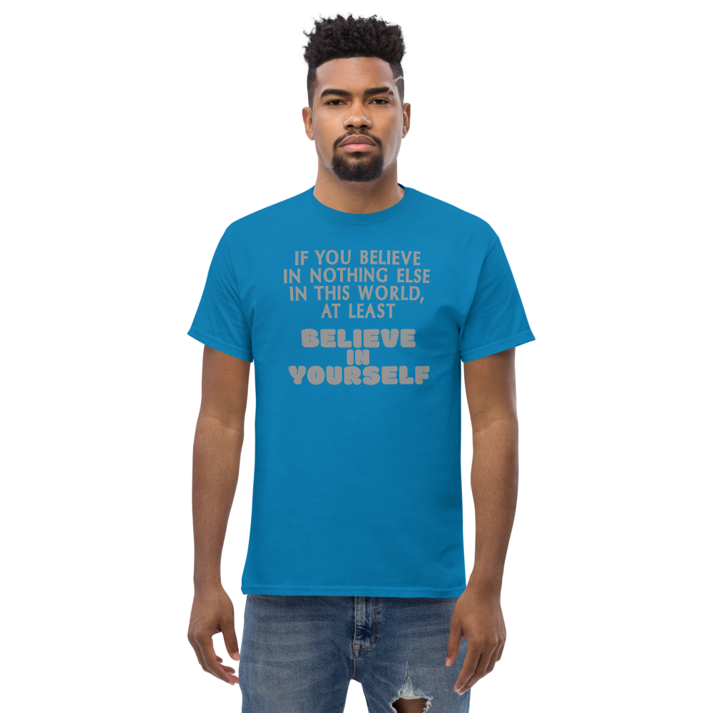 "If you believe in nothing else in this world, at least believe in yourself" printed on a sapphire unisex classic tee worn by a male