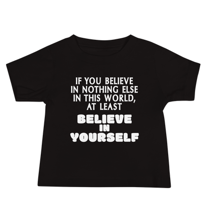 "If you believe in nothing else in this world, at least believe in yourself" printed on a black baby jersey short sleeve tee laying on a flat surface