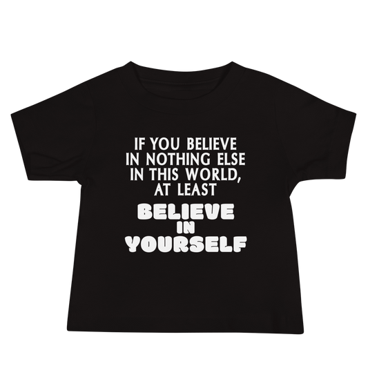 "If you believe in nothing else in this world, at least believe in yourself" printed on a black baby jersey short sleeve tee laying on a flat surface