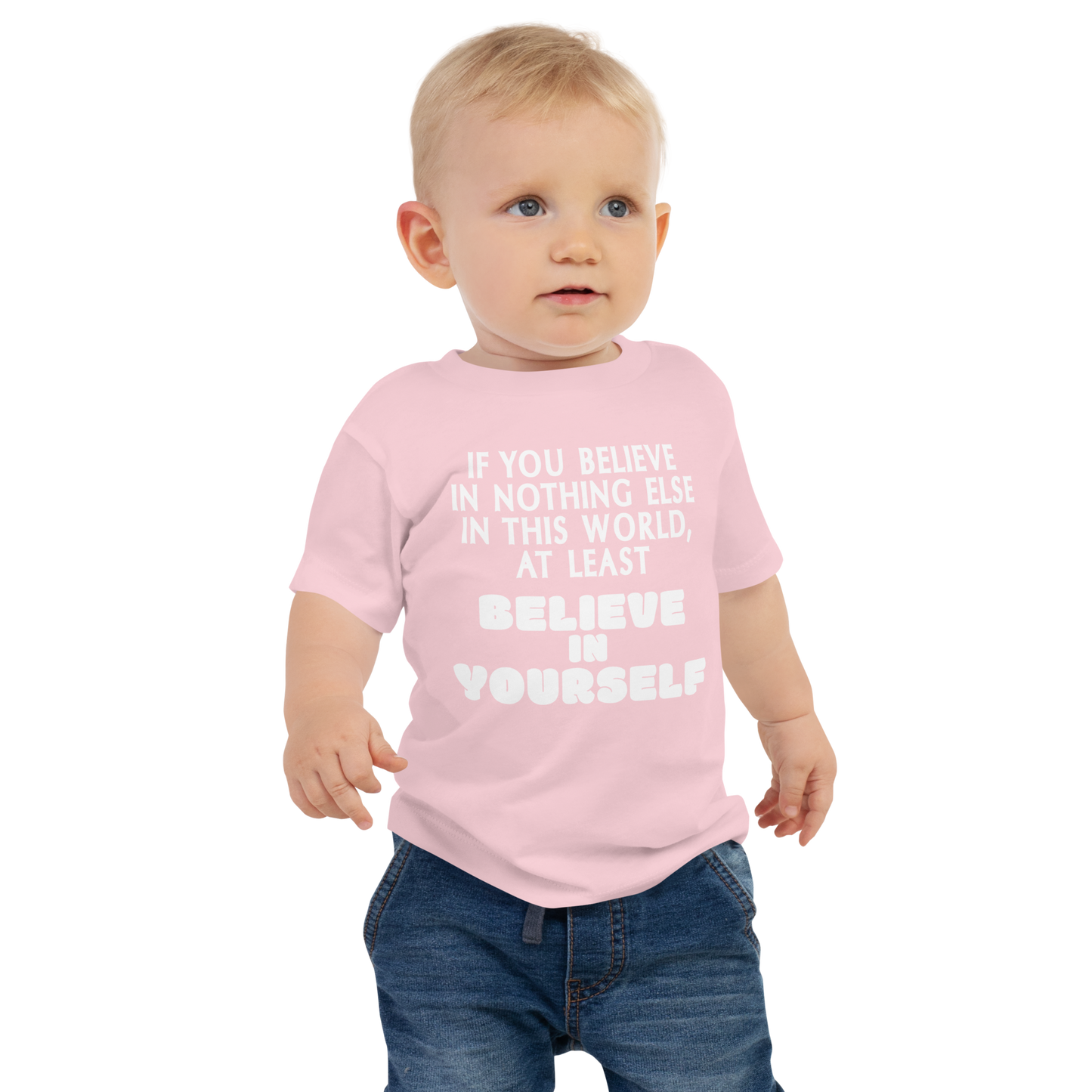 "If you believe in nothing else in this world, at least believe in yourself" printed on a pink baby jersey short sleeve tee worn by a male
