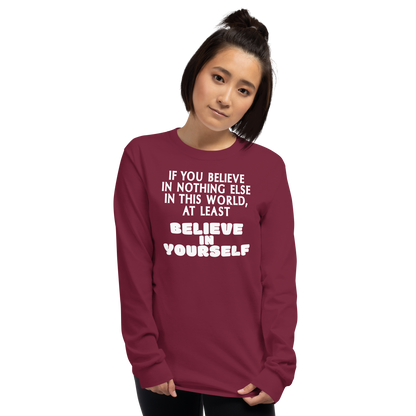 "If you believe in nothing else in this world, at least believe in yourself" printed on a maroon men's long sleeve shirt worn by a female