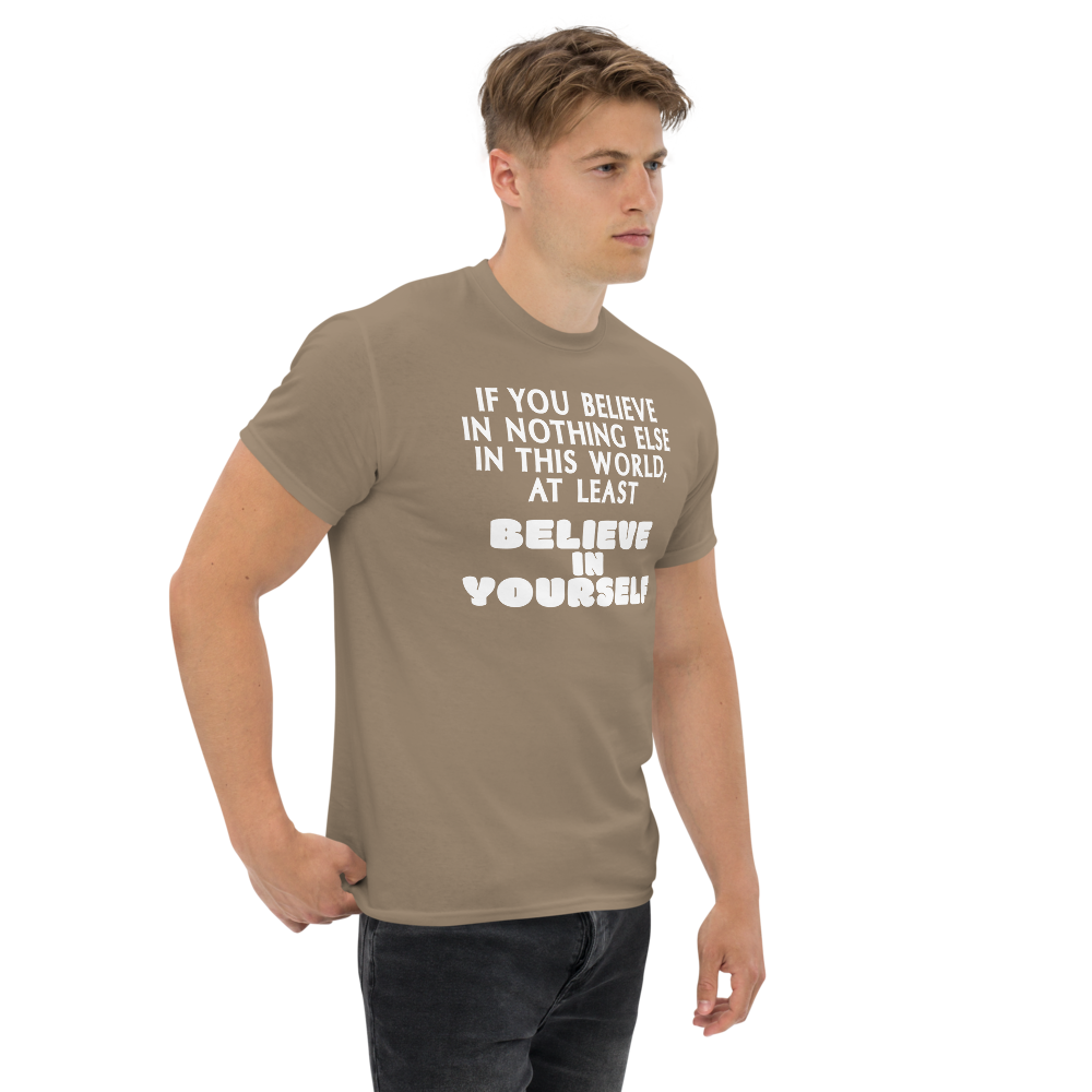 "If you believe in nothing else in this world, at least believe in yourself" printed on a brown savana unisex classic tee worn by a male