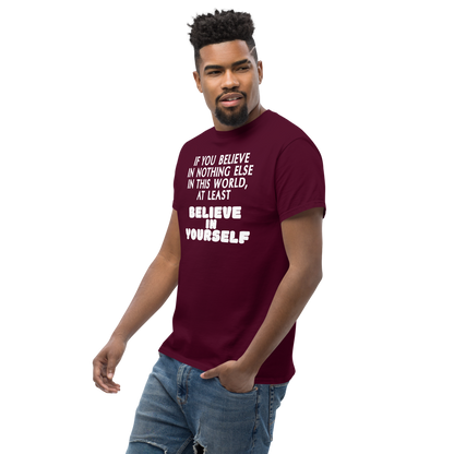 "If you believe in nothing else in this world, at least believe in yourself" printed on a maroon unisex classic tee worn by a male