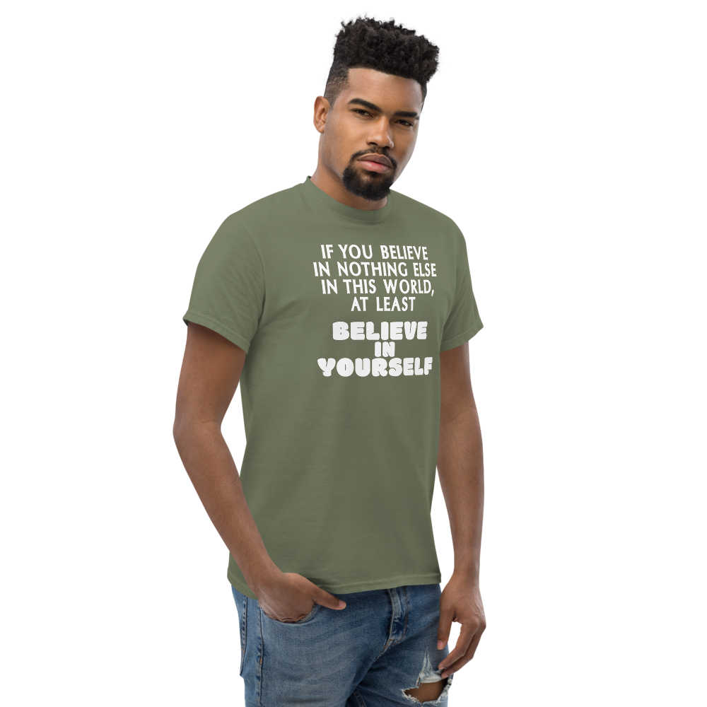 "If you believe in nothing else in this world, at least believe in yourself" printed on a military green unisex classic tee worn by a male