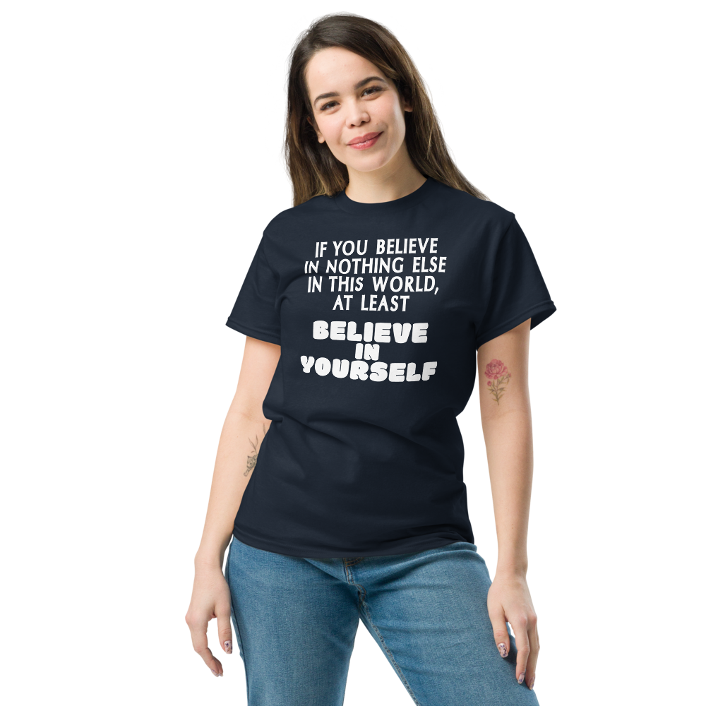"If you believe in nothing else in this world, at least believe in yourself" printed on a navy unisex classic tee worn by a female
