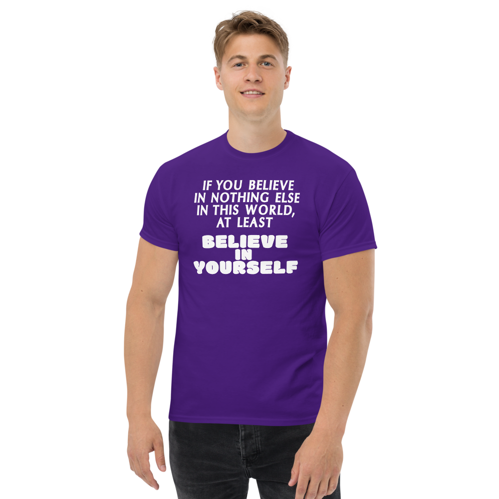 "If you believe in nothing else in this world, at least believe in yourself" printed on a purple unisex classic tee worn by a male