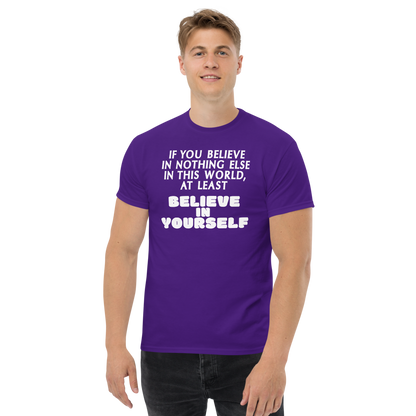 "If you believe in nothing else in this world, at least believe in yourself" printed on a purple unisex classic tee worn by a male