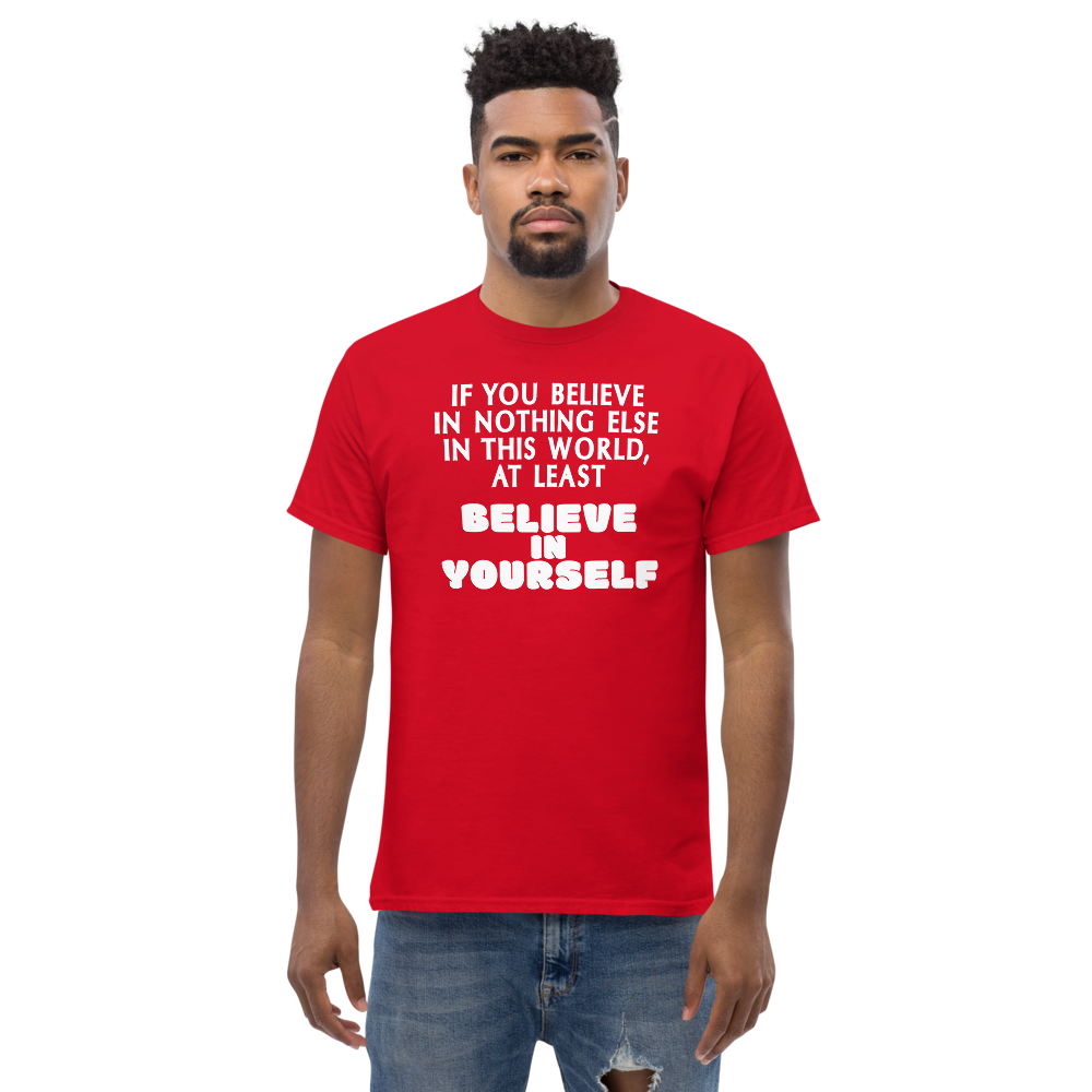 "If you believe in nothing else in this world, at least believe in yourself" printed on a red unisex classic tee worn by a male