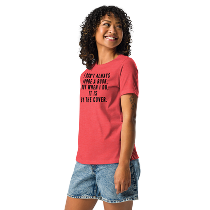 "I Don't always Judge a Book, but when I do, it's by the cover." printed on a heather red women's relaxed t-shirt worn by a female