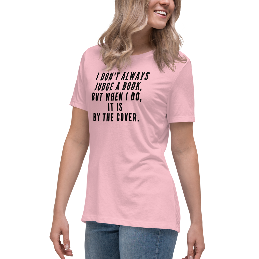 "I Don't always Judge a Book, but when I do, it's by the cover." printed on a pink women's relaxed t-shirt worn by a female