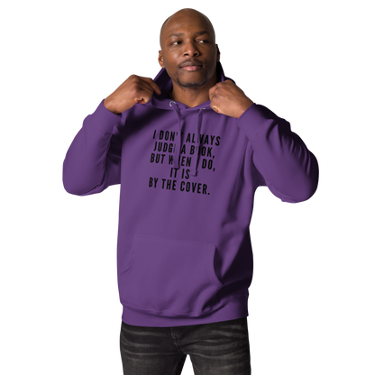 "I Don't always Judge a Book, but when I do, it's by the cover." printed on a purple unisex hoodie worn by a male