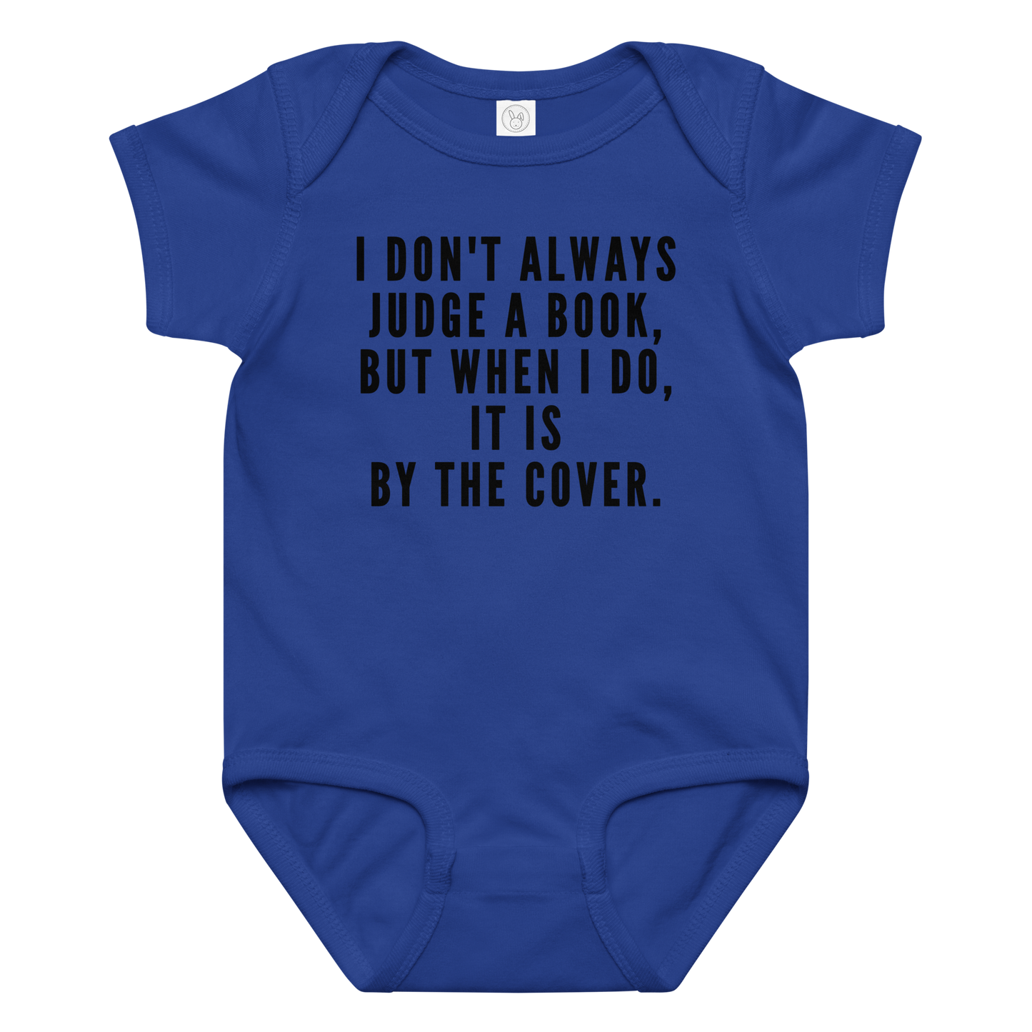 "I Don't always Judge a Book, but when I do, it's by the cover." printed on a royal baby jersey bodysuit laying on a flat surface amongst other clothes