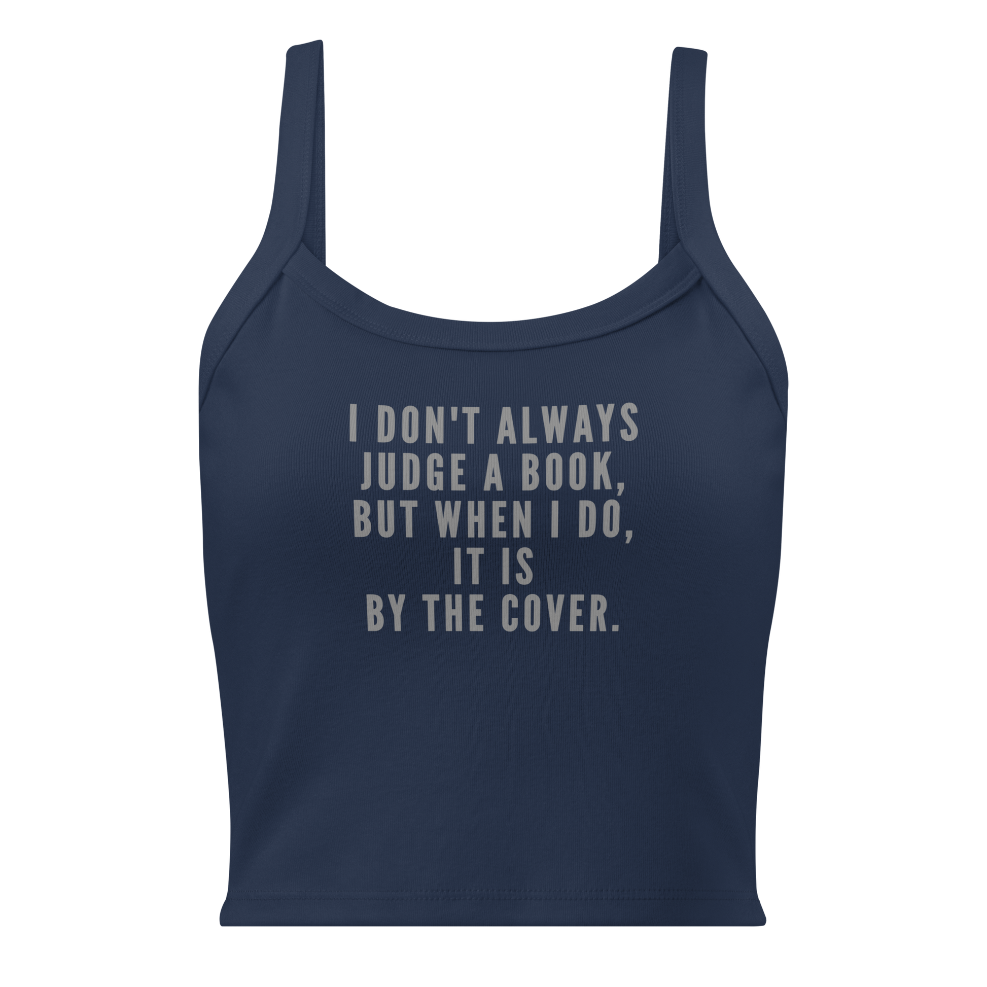 "I Don't always Judge a Book, but when I do, it's by the cover." printed on a solid navy blend women's micro-rib tanktop laying on a flat surface