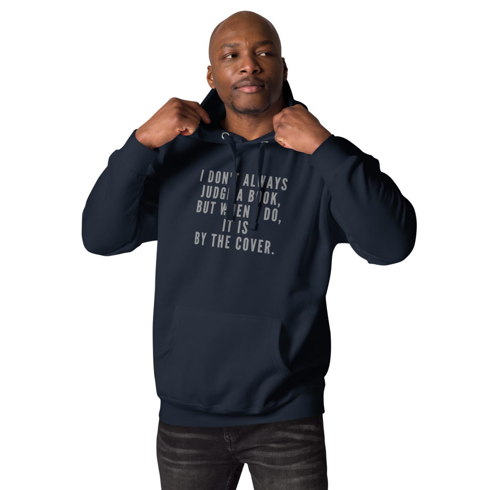 "I Don't always Judge a Book, but when I do, it's by the cover." printed on a navy blazer unisex hoodie worn by a male
