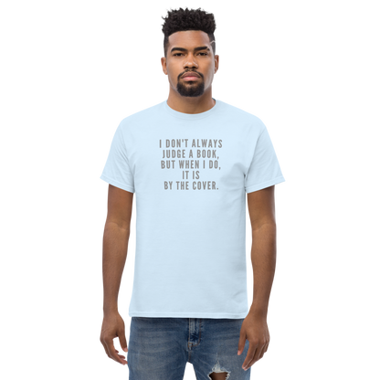 "I Don't always Judge a Book, but when I do, it's by the cover." printed on a light blue unisex classic tee worn by a male