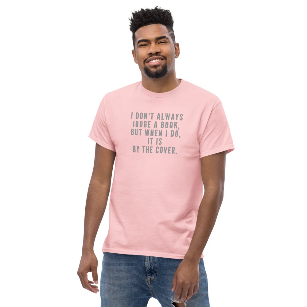 "I Don't always Judge a Book, but when I do, it's by the cover." printed on a light pink unisex classic tee worn by a male