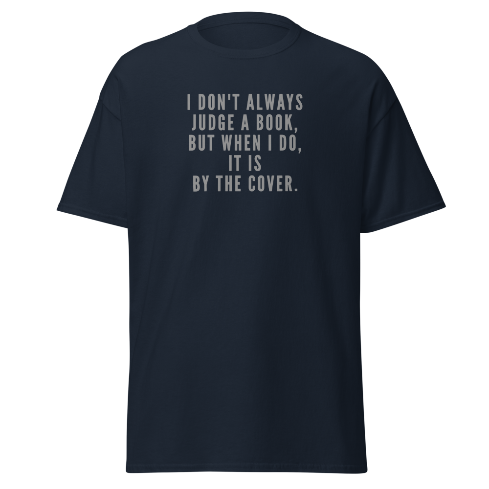 "I Don't always Judge a Book, but when I do, it's by the cover." printed on a navy unisex classic tee laying on a flat surface