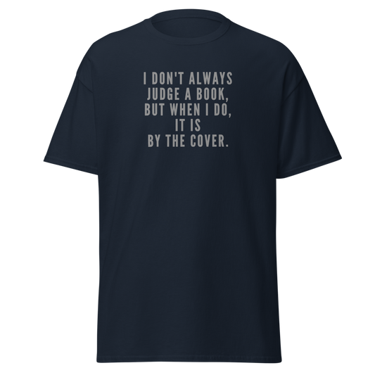"I Don't always Judge a Book, but when I do, it's by the cover." printed on a navy unisex classic tee laying on a flat surface