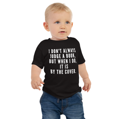 "I Don't always Judge a Book, but when I do, it's by the cover." printed on a black baby jersey short sleeve tee worn by a male
