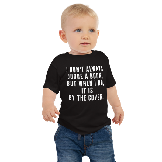 "I Don't always Judge a Book, but when I do, it's by the cover." printed on a black baby jersey short sleeve tee worn by a male