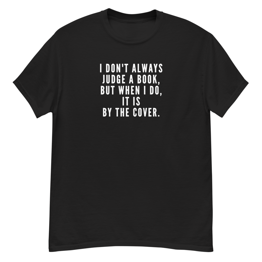 "I Don't always Judge a Book, but when I do, it's by the cover." printed on a black unisex classic tee laying on a flat surface