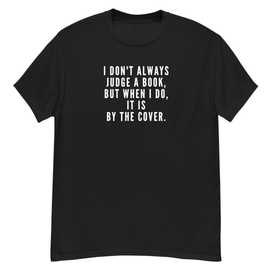 "I Don't always Judge a Book, but when I do, it's by the cover." printed on a black unisex classic tee laying on a flat surface