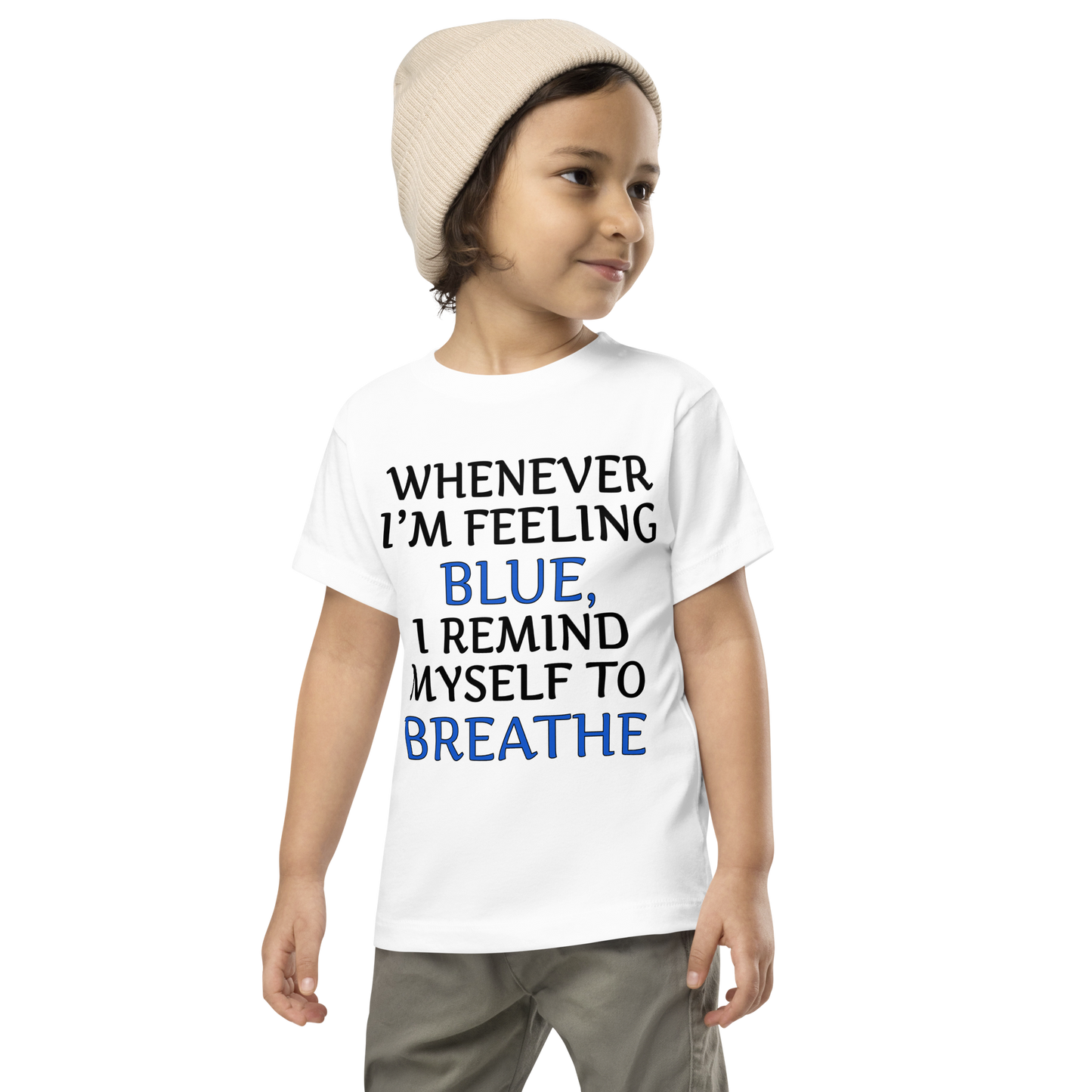 "Whenever I'm feeling blue, I remind myself to breathe" printed on a white toddler short sleeve tee worn by a male wearing a cap