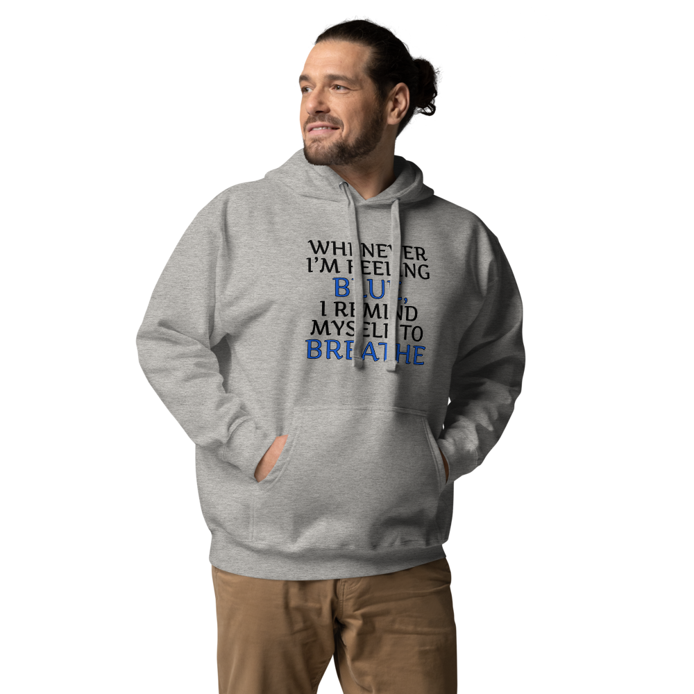 "Whenever I'm feeling blue, I remind myself to breathe" printed on a carbon grey unisex hoodie worn by a male