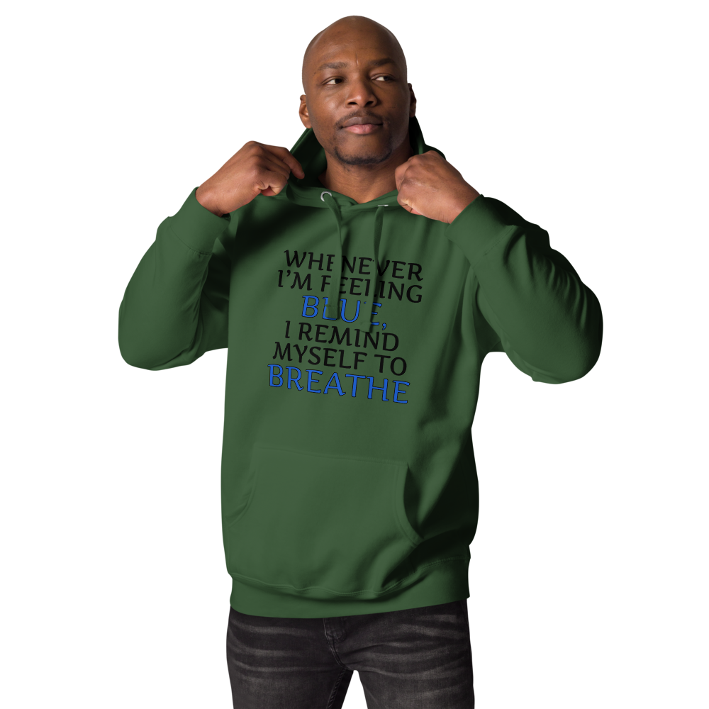 "Whenever I'm feeling blue, I remind myself to breathe" printed on a forest green unisex hoodie worn by a male