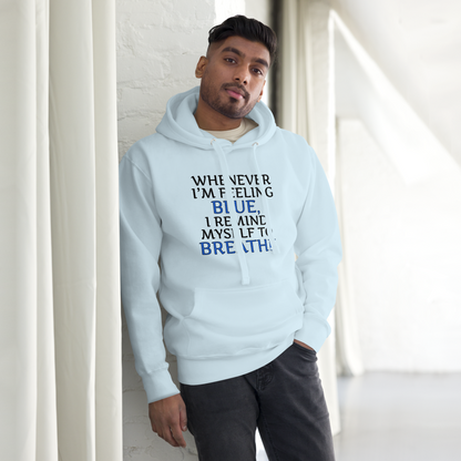 "Whenever I'm feeling blue, I remind myself to breathe" printed on a sky blue unisex hoodie worn by a male