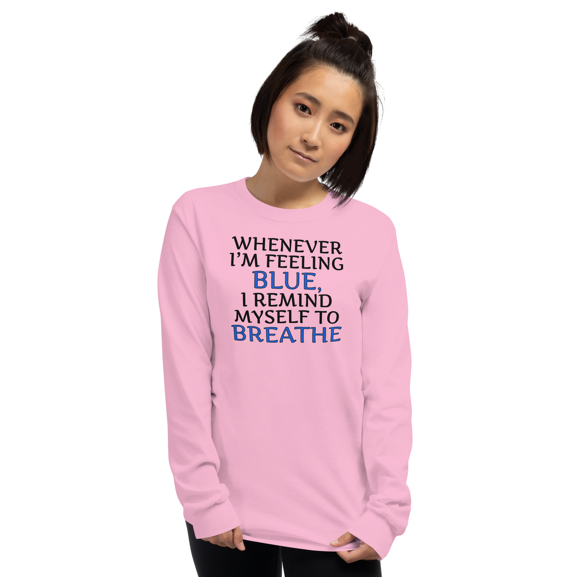 "Whenever I'm feeling blue, I remind myself to breathe" printed on a light pink men's long sleeve shirt worn by a female