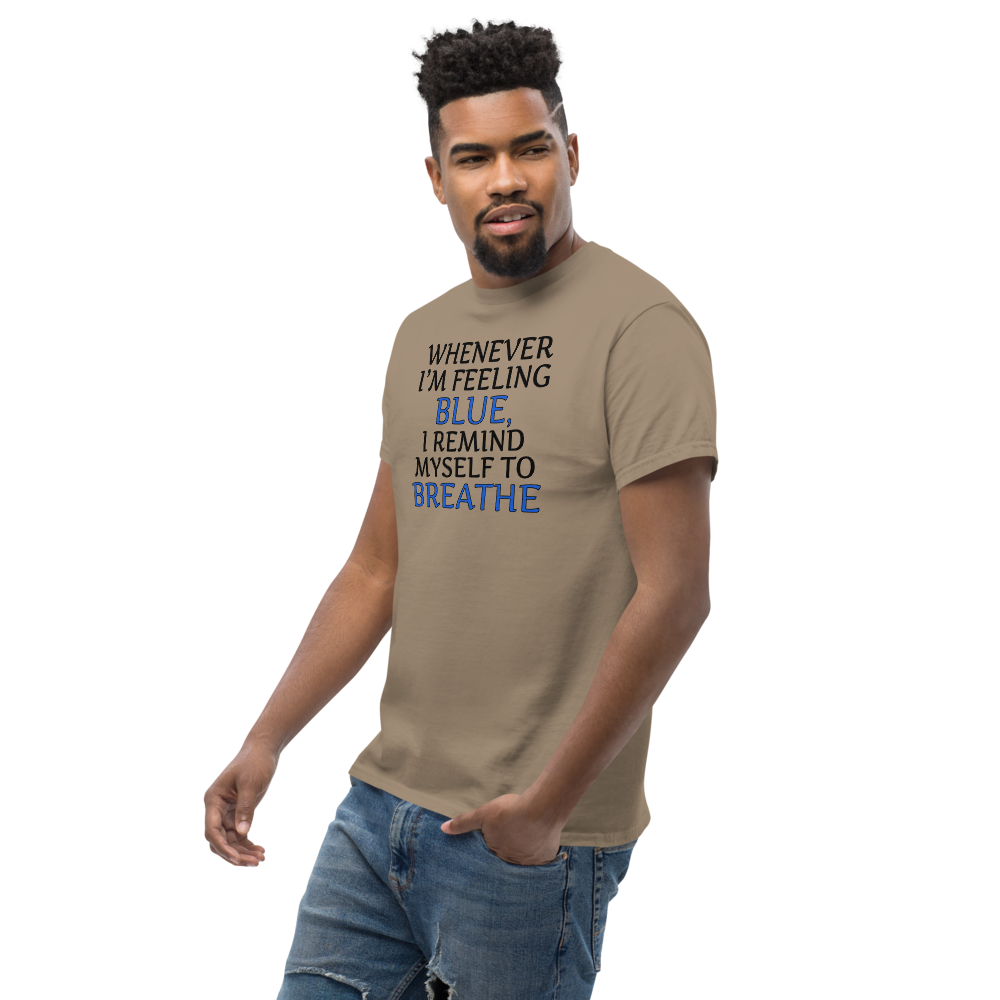 "Whenever I'm feeling blue, I remind myself to breathe" printed on a brown savana unisex classic tee worn by a male