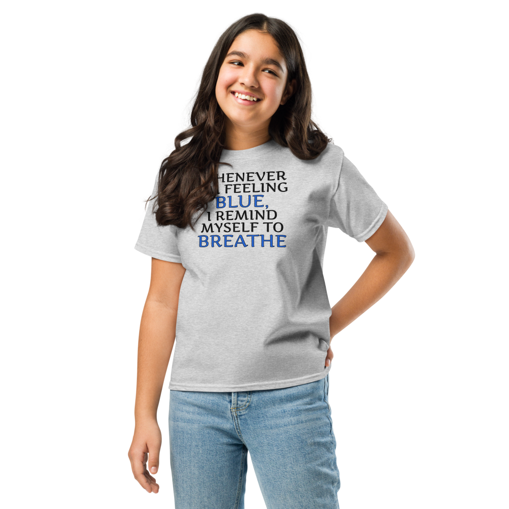 "Whenever I'm feeling blue, I remind myself to breathe" printed on a sport grey youth classic tee worn by a female