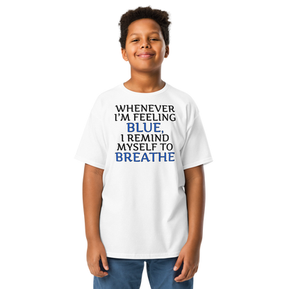 "Whenever I'm feeling blue, I remind myself to breathe" printed on a white youth classic tee worn by a male