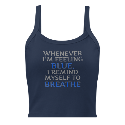 "Whenever I'm feeling blue, I remind myself to breathe" printed on a solid navy blend women's micro-rib tanktop laying on a flat surface