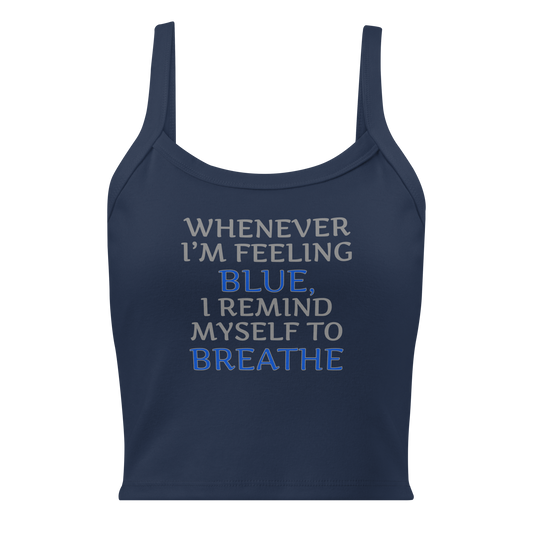 "Whenever I'm feeling blue, I remind myself to breathe" printed on a solid navy blend women's micro-rib tanktop laying on a flat surface