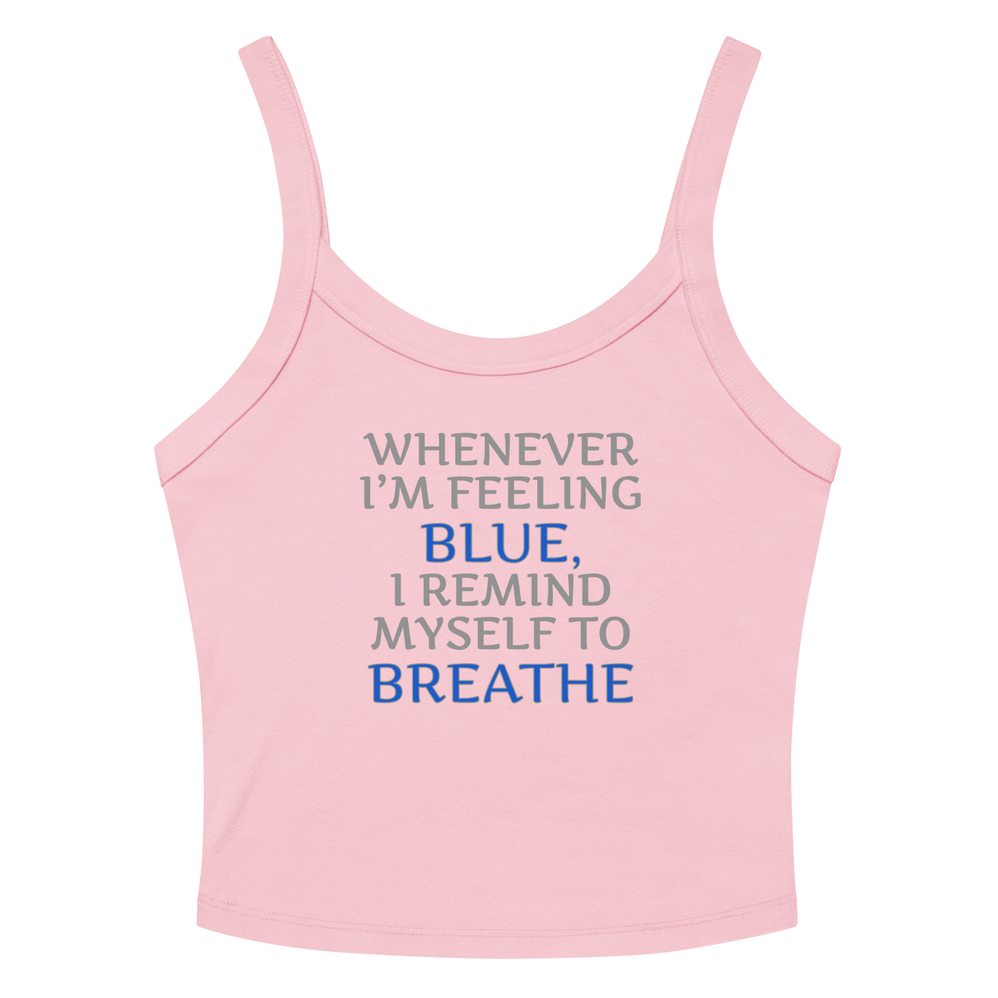 "Whenever I'm feeling blue, I remind myself to breathe" printed on a solid pink blend women's micro-rib tanktop laying on a flat surface amongst sunglasses and shorts