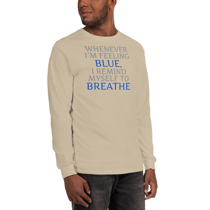 "Whenever I'm feeling blue, I remind myself to breathe" printed on a sand men's long sleeve shirt worn by a male